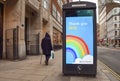 A man walks past a \'Thank You NHS\' poster in Central London