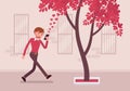 Man walks with smartphone to bump into a tree Royalty Free Stock Photo