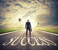 Man walks on a success way. Concept of successful businessman and company startup Royalty Free Stock Photo