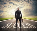 Man walks on a success way. Concept of successful businessman and company startup Royalty Free Stock Photo