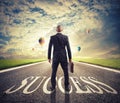 Man walks on a success way. Concept of successful businessman and company startup Royalty Free Stock Photo