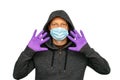 Man was defending himself and fighting the corona virus and other diseases by wearing gloves and hygiene mask.