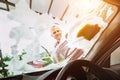 Man washes car front windows with soap foam Royalty Free Stock Photo