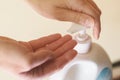 A man washes his hands in a public place. The concept of the use of disinfectants