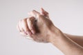 A man washes his hands with soap and water