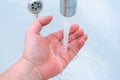 Man washing his hands under running water in the bathroom Royalty Free Stock Photo