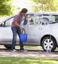 Man Washing Car In Drive Royalty Free Stock Photo