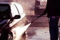 Man washing car with pressure washer Royalty Free Stock Photo