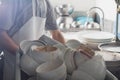 Man washing dish in sink Royalty Free Stock Photo