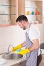 Man washing dishes Royalty Free Stock Photo