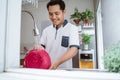 Man washing dishes Royalty Free Stock Photo