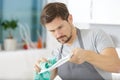 Man washing dishes in sink Royalty Free Stock Photo