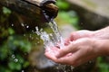Man washing hands in fresh, cold, potable water Royalty Free Stock Photo