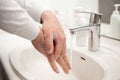 Man washing hands with soap at home. coronavirus prevention hand hygiene