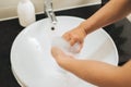 Man washing hands with soap under running water Royalty Free Stock Photo