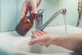 Man washing his Hands to prevent virus infection and clean dirty hands. /Man washes hands with soap Royalty Free Stock Photo