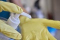 Man washing window in protective gloves closeup. Cleaning of apartments concept.