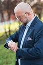 The man with the watch before meeting.