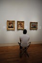 Man watching on the art picture at museum Royalty Free Stock Photo