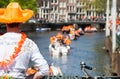 Man is watching boats - Koninginnedag 2012 Royalty Free Stock Photo
