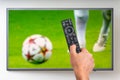 Man is watching football match on TV Royalty Free Stock Photo