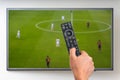 Man is watching football match on TV Royalty Free Stock Photo