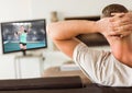 Man watching handball on television at home Royalty Free Stock Photo