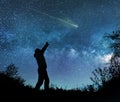 Man watching the stars in night sky Royalty Free Stock Photo