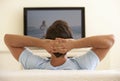 Man Watching Widescreen TV At Home Royalty Free Stock Photo