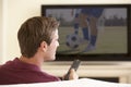 Man Watching Widescreen TV At Home Royalty Free Stock Photo