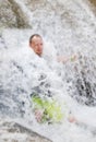 Man in the Waterfall Royalty Free Stock Photo