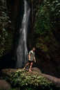 A man at the waterfall. A person travels around the world. The man at the waterfall. Travel to Bali, Indonesia.