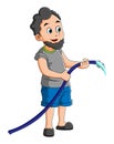The man is watering the garden and the park with the water from the hose Royalty Free Stock Photo