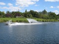 Man waterskiing slalom