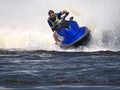 Man on Wave Runner on the water Royalty Free Stock Photo