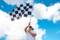 Man waving a checkered flag on a raceway Royalty Free Stock Photo