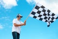 Man waving a checkered flag on a raceway Royalty Free Stock Photo