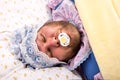 Man weared as baby sleeping Royalty Free Stock Photo