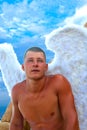 Man Wearing Angel Wings Royalty Free Stock Photo
