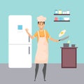 Man wearing apron holding pan in hand, cooking friend eggs, culinary concept, hobby, leisure