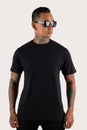 Tattooed man wearing black t-shirt