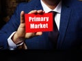 Man wearing blue business suit and showing blank red business card with written text Primary Market