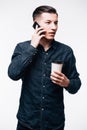 Man wearing casual clothes talking on a mobile phone Royalty Free Stock Photo