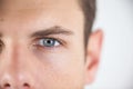 Man wearing contact lens Royalty Free Stock Photo