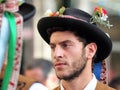 A man wearing the costume of the Pauliteiros de Miranda do Douro