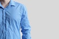 Man wearing creased shirt on light background, closeup. Space for text Royalty Free Stock Photo