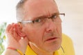 Man wearing deaf aid Royalty Free Stock Photo