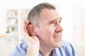 Man wearing deaf aid Royalty Free Stock Photo