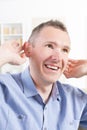 Man wearing deaf aid Royalty Free Stock Photo