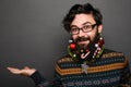 Man wearing eyewear showing something on the palm Royalty Free Stock Photo